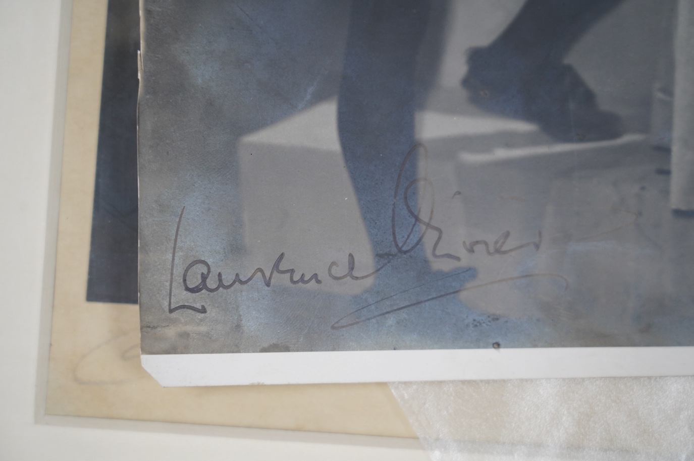 A theatrical archive of signed photos, a poster and books relating to John Gielgud and Laurence Olivier, including; a framed signed photograph of John Gielgud as Hamlet dated 1935, together with two signed photographs da